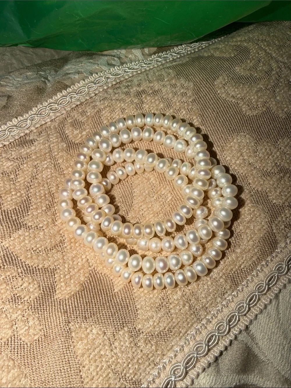 Set of four creamy pearls button style STRECH bracelets